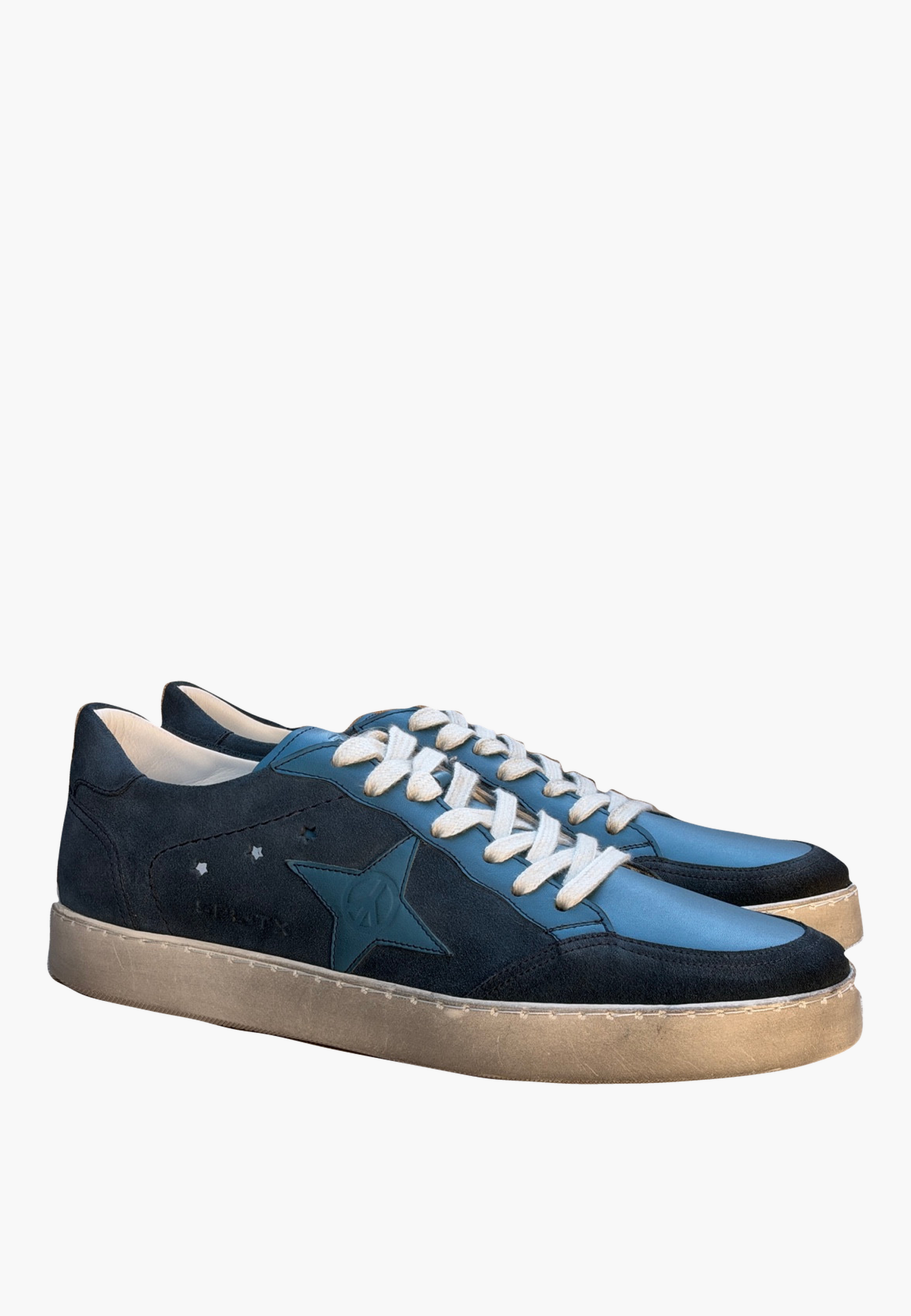 Estrella Sneaker Denim Blue in two-tone suede and leather, with tonal star detail, light-colored laces and lightly distressed soles