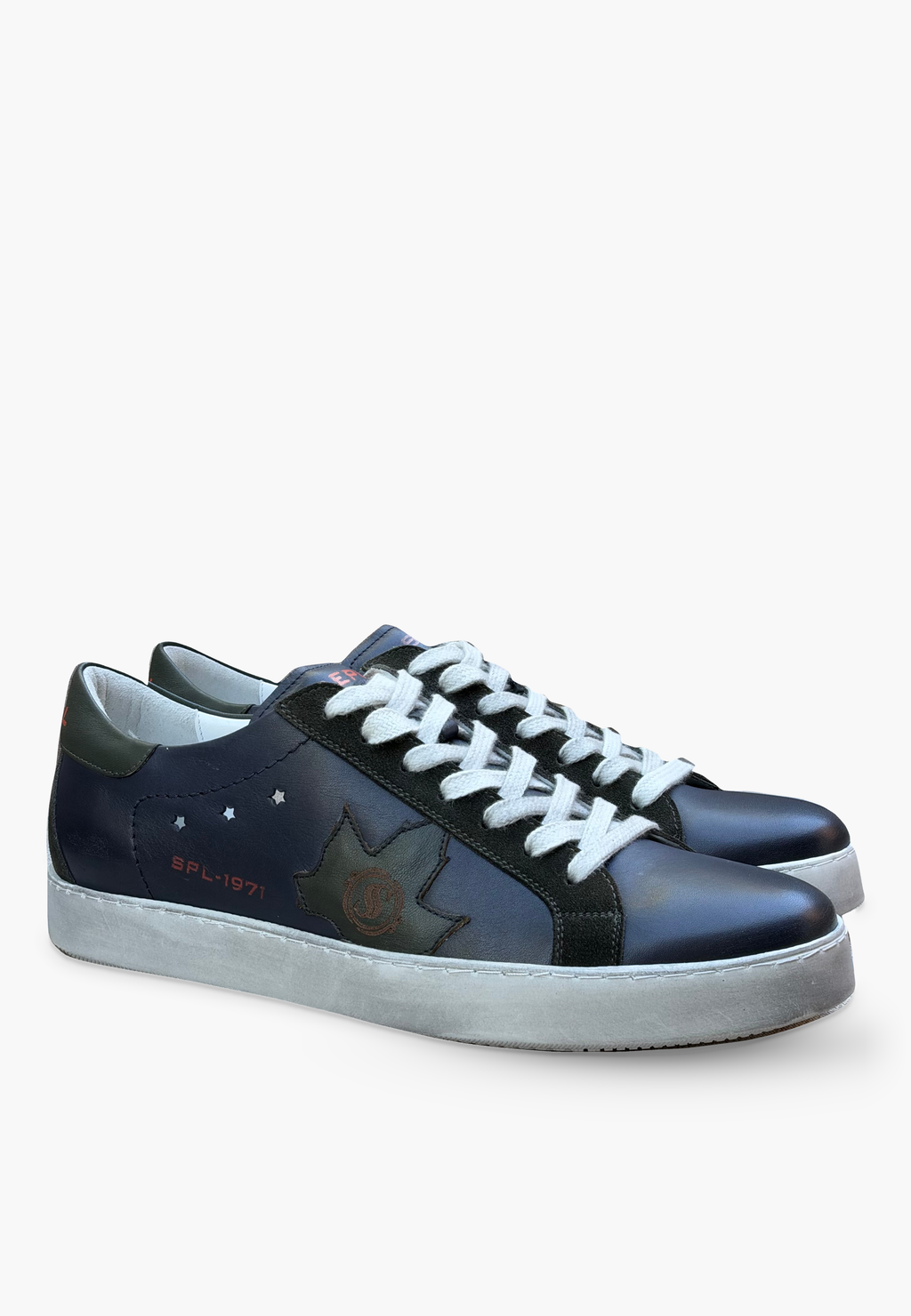 Navy and dark green leather sneaker pair