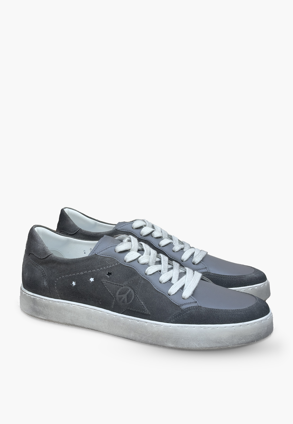 Estrella Sneaker Smoke Grey in grey leather and charcoal suede with a tonal dark star and lightly distressed sole